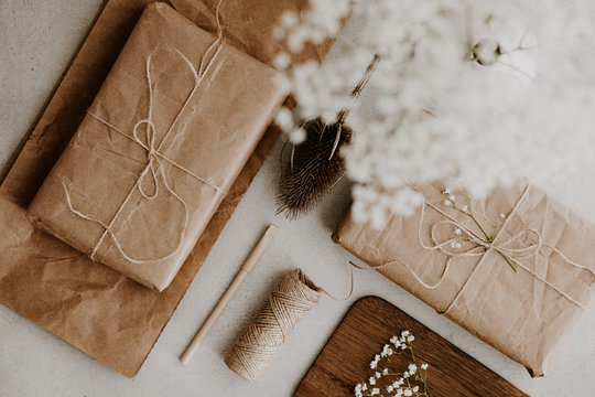 Gift Wrapped In Ecofriendly Recycled Paper With Dried Flowers And String