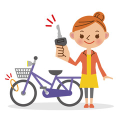 自転車にカギをかける女性