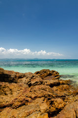 Fototapeta na wymiar beauty in nature, Kapas Island located in Terengganu, Malaysia under bright sunny day and cloudy sky
