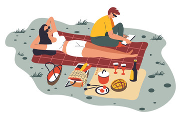 Couple on picnic, sunbathing woman and reading man