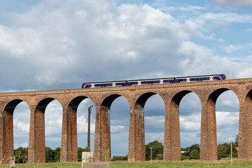 Train passing over Culloden Viaduct