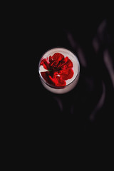 clean coctail with red flowers