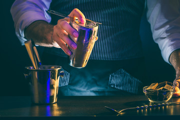 Bartender making cocktail
