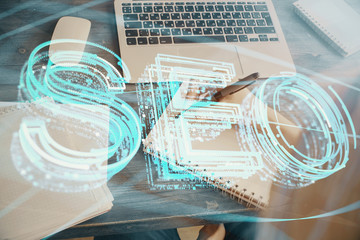 Multi exposure of woman's hands making notes with SEO icon. Concept of Search engine optimization