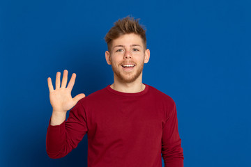 Naklejka premium Attractive young guy with a red T-shirt