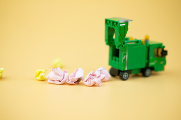 Garbage truck ready to move small of unnecessary wrinkled paper