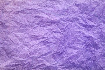Purple crumpled paper background