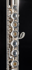 Flute on black background