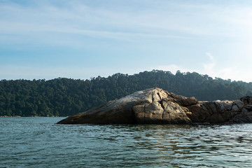 Fototapeta premium sightseeing crocodile look rock during Island hoping activity in Pangkor Island, Perak State, Malaysia