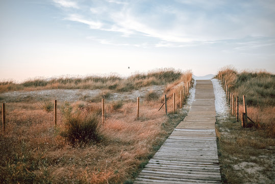 Wood passarel over the dunes on Vao beach in Vigo, Spain