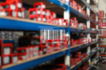 Barcode and blurred view of modern wholesale store