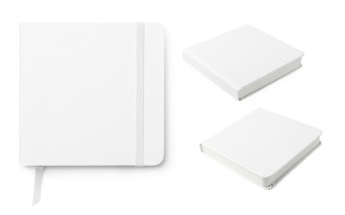 Set of white notebooks on white background