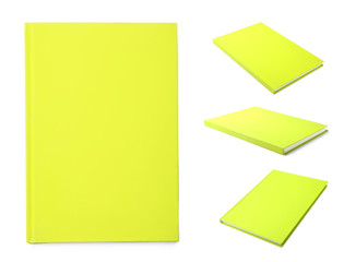 Set of yellow notebooks on white background
