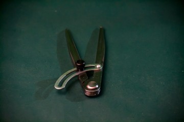 Joiner compasses on a green background