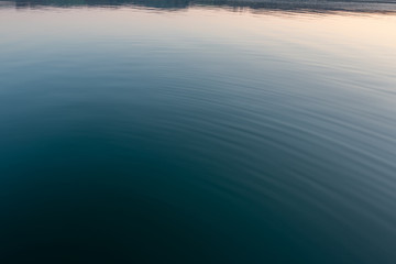 Fototapeta premium Photo of carm water at dusk in Wales 