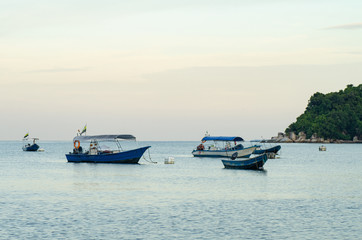 Fototapeta na wymiar group of speed boat for island hoping activities moored on the Nipah Bay pangkor Island, Malaysia