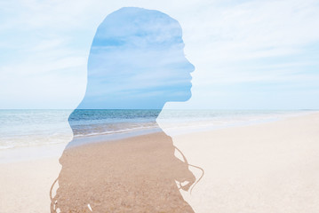 Double exposure with silhouette of woman and sea landscape. Concept of psychological health - obrazy, fototapety, plakaty