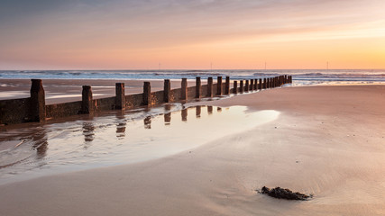 Landscape view of Sunrise at Blyth Beach on the coast of the county of Northumberland, England, UK.