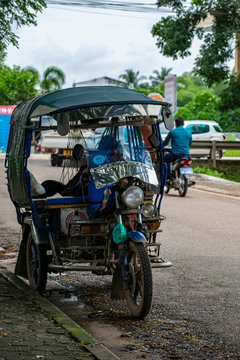 Tuk tuk on the road Laos Asia