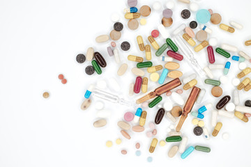 various Pharmaceutical tablets, capsules, therapy drugs and pills on white background