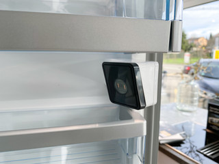 Modern refrigerator freezer with interior video camera capabilities Smart Home IOT device