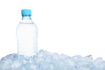 Ice cubes and mineral water on white background