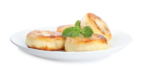 Delicious cottage cheese pancakes with mint isolated on white