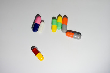 colorful pills isolated on white background
