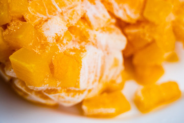 Frozen Sliced Pumpkin. Closeup of frozen pumpkin slices