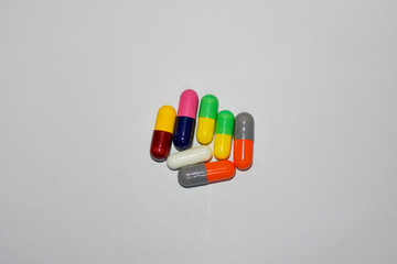 colorful pills isolated on white background