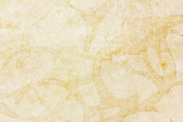 Brown paper texture. Coffee mug stamp. Grunge parchment design background. Coffee cup ring on paper. Stained message letter backdrop. Vintage ancient empty copy space background.