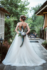 Fototapeta premium Beautiful bride posing in her wedding day