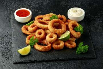 Oven baked breaded calamari rings served with lime wedges, sweet chilli sauce and mayonnaise