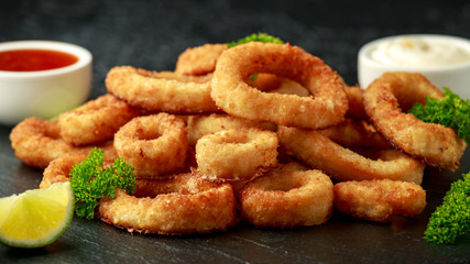 Oven baked breaded calamari rings served with lime wedges, sweet chilli sauce and mayonnaise