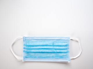 Blue surgical mask on white background 