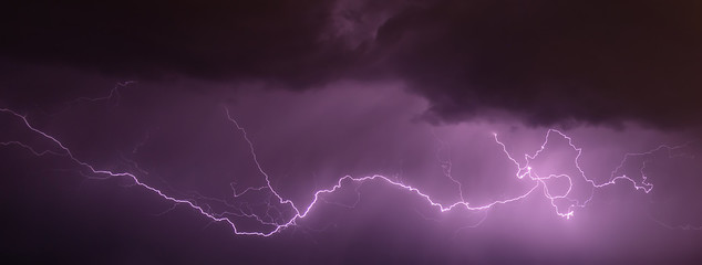 Night sky with various lightning in natural colors.