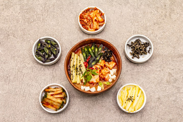 Traditional Korean spicy soup with kimchi, tofu, vegetables. Hot dish for healthy meal