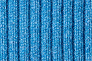 Blue knitted fabric background texture for design, trend color classic blue