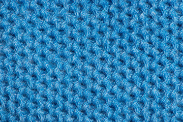 Blue knitted fabric background texture for design, trend color classic blue