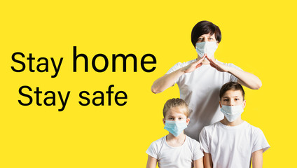 Woman children boy girl in medical masks for protection against coronovirus disease. Concept Covid 19 . Tex stay home