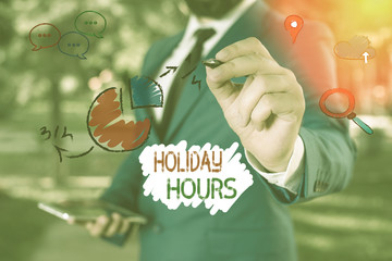 Conceptual hand writing showing Holiday Hours. Concept meaning Overtime work on for employees under...