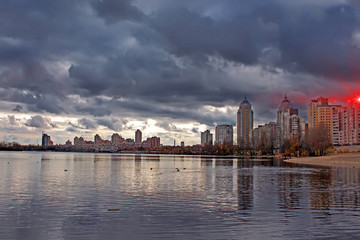 Obolon embankment in the autumn, Kyiv, Ukraine. Sun beam