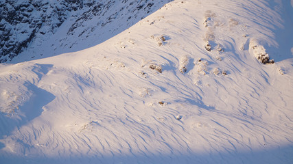 Cold snowy white winter landscapes near Fredvang village on the Lofoten Islands in Norway.