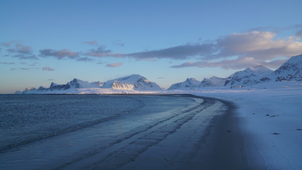 Cold snowy white winter landscapes near Fredvang village on the Lofoten Islands in Norway.