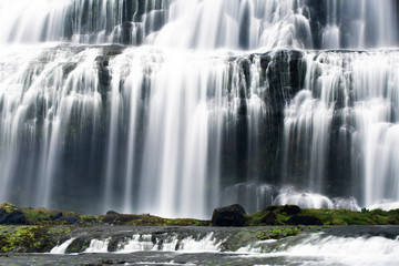 Fototapeta na wymiar Waterfall stream at low speed in Iceland