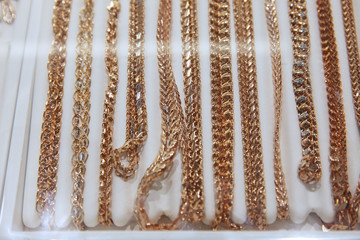 Gold chains of various weaves made of precious metal