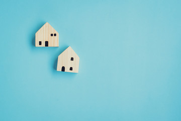 House wood model concept on blue background and copy space for text