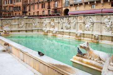 Fonte Gaia monumental fountain at the Piazza del Campo square in Siena city, Tuscany, Italy.  built...