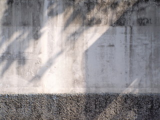 old plaster brick wall with shading 