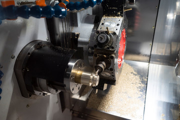 machining automotive part by cnc turning machine